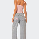 Trendige Wide-Leg Jeans mit verspielten Stickereien und modernem Schnitt