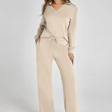 Damen Freizeitanzug mit Zipper-Pullover und weiter Hose