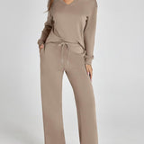 Damen Freizeitanzug mit Zipper-Pullover und weiter Hose