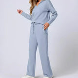 Damen Freizeitanzug mit Zipper-Pullover und weiter Hose