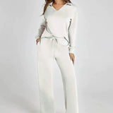 Damen Freizeitanzug mit Zipper-Pullover und weiter Hose