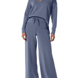 Damen Freizeitanzug mit Zipper-Pullover und weiter Hose