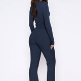 Laureen | Ausgestellter Jumpsuit mit langen Ärmeln