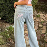 Trendige Wide-Leg Jeans mit verspielten Stickereien und modernem Schnitt