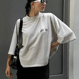 Oversized Damen T-Shirt in Grau mit kleinem Logo-Print