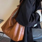 Caroly | Minimalistische Schultertasche aus Kunstleder