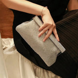 Aurielle | Goldene Clutch mit Kristallbesatz & Schnappverschluss – Elegante Abendtasche für Damen