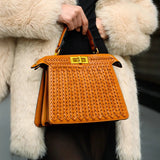 Estelle | Elegante geflochtene Handtasche mit Drehverschluss & goldenen Details